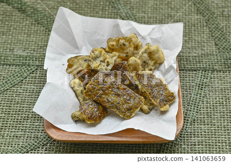 Snack food: Seaweed tempura with wasabi flavor Snack food: Seaweed tempura with wasabi flavor 141063659