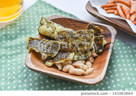 A classic snack: seaweed tempura and peanuts A classic snack: seaweed tempura and peanuts 141063664