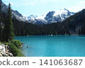 The emerald green lake of Joffre Lake overlooking the glacier 141063687