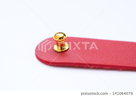 red leather strap isolated on white background red leather strap isolated on white background 141064079