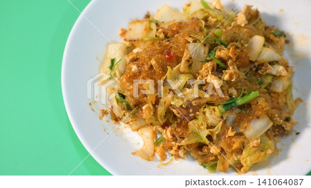 stir fried sukiyaki with egg and pork on white plate stir fried sukiyaki with egg and pork on white plate 141064087