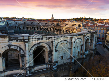 Roman amphitheatre and cityscape of Nimes Roman amphitheatre and cityscape of Nimes 141064368