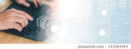 Businessman typing on laptop keyboard with virtual global network icon and modern office building. Concept of digital transformation, international business investment, and banner copy space Businessman typing on laptop keyboard with virtual global network icon and modern office building. Concept of digital transformation, international business investment, and banner copy space 141064563