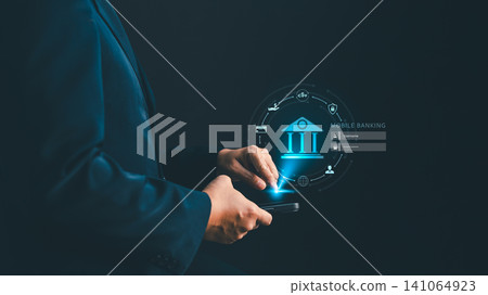 Businessman using smartphone for mobile banking online transaction with futuristic digital interface, securing finance technology, global currency transfer network concept 141064923