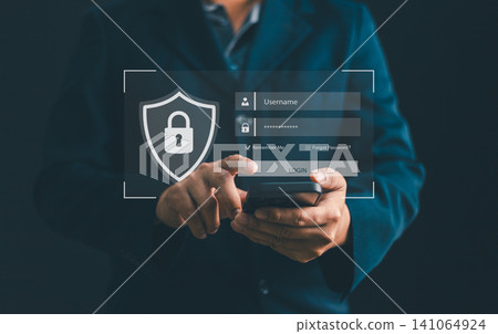 Businessman using smartphone for secure login with virtual interface. Concept of cybersecurity, data protection, network safety, privacy, and cyber insurance in corporate business technology 141064924