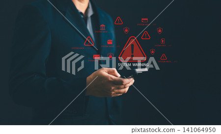 Businessman using smartphone with red system warning icons and digital hacking alerts for cybersecurity concept, data breach notification, and internet server vulnerability on dark background Businessman using smartphone with red system warning icons and digital hacking alerts for cybersecurity concept, data breach notification, and internet server vulnerability on dark background 141064950