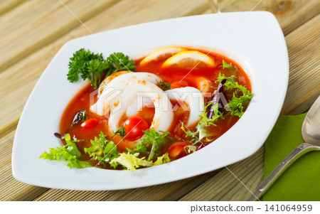 Tomato soup with squid is tasty dish 141064959