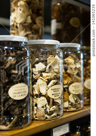 Dried mushrooms in jars for sale 141065239