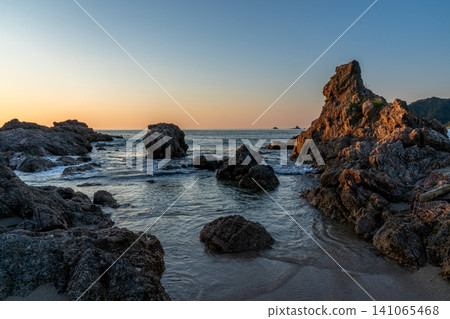 Sasagawa Flow, the setting sun sinking behind Benten Rock Sasagawa Flow, the setting sun sinking behind Benten Rock 141065468