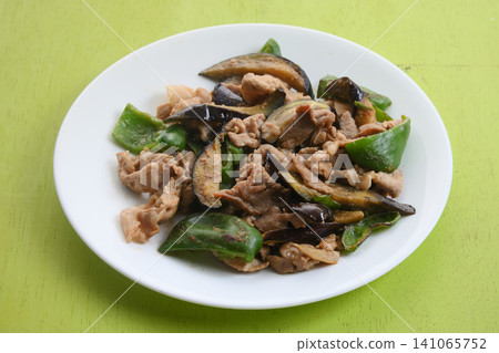 Stir-fried eggplant, green pepper and pork with miso Stir-fried eggplant, green pepper and pork with miso 141065752