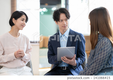 Engineers having a meeting in the office Engineers having a meeting in the office 141066415