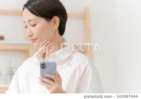 Middle women watching smaho Middle women watching smaho 141067444