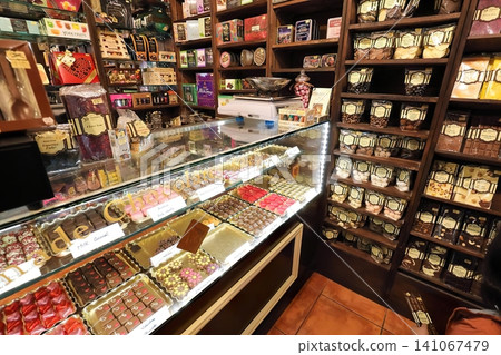 Candy and chocolate sweets in a store display case Candy and chocolate sweets in a store display case 141067479