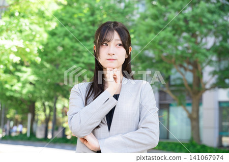 Japanese woman worried Japanese woman worried 141067974