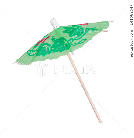 Small green cocktail paper umbrella decoration isolated on white background Small green cocktail paper umbrella decoration isolated on white background 141068047