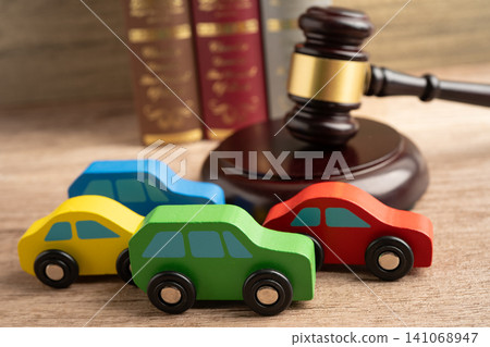 Hammer gavel judge with car vehicle accident, insurance coverage claim lawsuit court case. Hammer gavel judge with car vehicle accident, insurance coverage claim lawsuit court case. 141068947