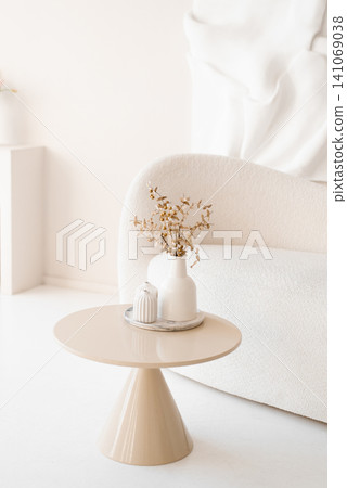 Stylish Interior Decor on Beige Coffee Table Stylish Interior Decor on Beige Coffee Table 141069038