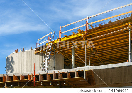 Concrete Structure Construction with Formwork, Scaffolding and Ladder at Modern Building Site Project Concrete Structure Construction with Formwork, Scaffolding and Ladder at Modern Building Site Project 141069061