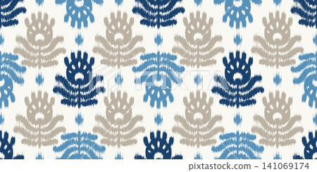 Ikat seamless pattern with abstract blue floral ornament. Ethnic vector rug textured print with batik watercolor effect for textile and carpet. Tribal orient background. Bohemian decorative grunge bg Ikat seamless pattern with abstract blue floral ornament. Ethnic vector rug textured print with batik watercolor effect for textile and carpet. Tribal orient background. Bohemian decorative grunge bg 141069174