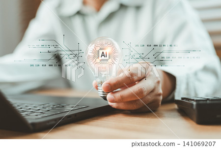 Businessperson holding light bulb with AI microchip and digital circuit interface. Advanced artificial intelligence processor technology for smart innovations and computing power Businessperson holding light bulb with AI microchip and digital circuit interface. Advanced artificial intelligence processor technology for smart innovations and computing power 141069207