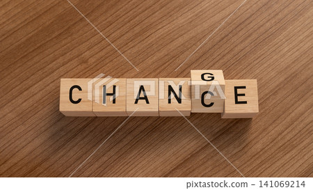 Wooden blocks turning the word CHANCE into CHANGE on a desk. A conceptual image representing personal growth, business transformation, strategy, and embracing new opportunities Wooden blocks turning the word CHANCE into CHANGE on a desk. A conceptual image representing personal growth, business transformation, strategy, and embracing new opportunities 141069214