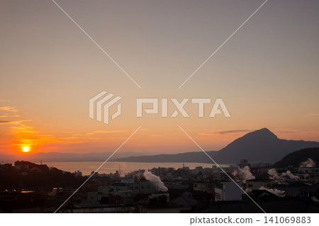 Beppu city morning glow and snowmobile 141069883
