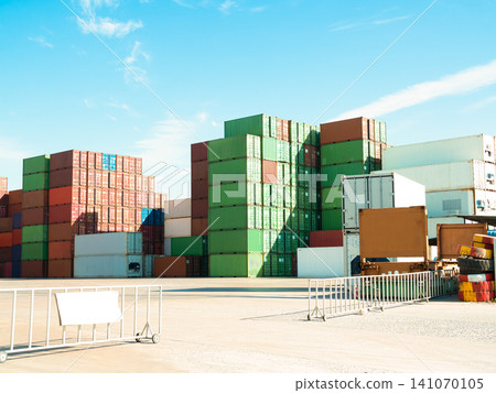 Container cargo industrial yard shipping export logistic crane forklift port blue sky background space road import business freight logistic transport industry service, transportation terminal. Container cargo industrial yard shipping export logistic crane forklift port blue sky background space road import business freight logistic transport industry service, transportation terminal. 141070105