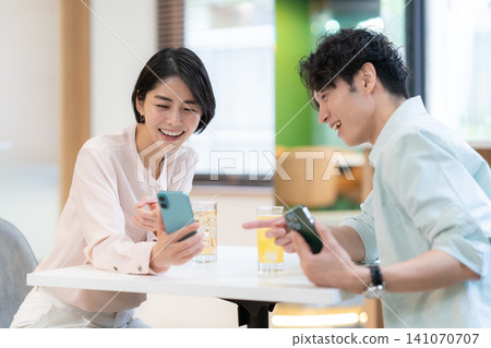 A couple doing dates at a cafe 141070707