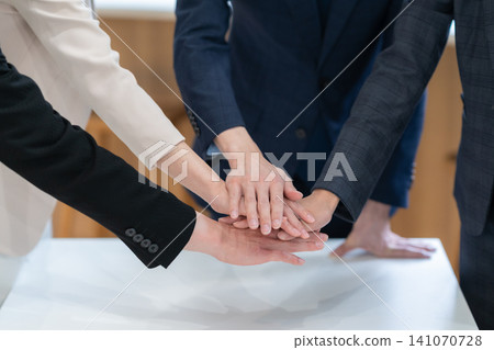 Businessmen collaborating in the office Businessmen collaborating in the office 141070728