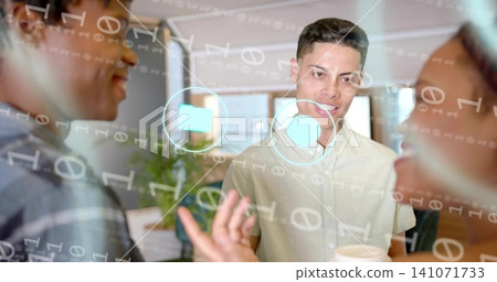 Explaining, man in light shirt gesturing at glass board at office beside coworker with coffee Explaining, man in light shirt gesturing at glass board at office beside coworker with coffee 141071733
