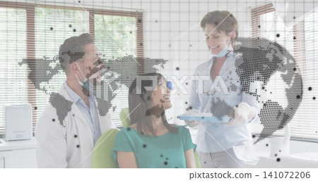 Female patient smiling and reclining in dental clinic green chair, with blue tray and map overlay Female patient smiling and reclining in dental clinic green chair, with blue tray and map overlay 141072206