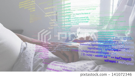 Holding female caregiver comforting senior male patient at bedside, showing gown and code overlay Holding female caregiver comforting senior male patient at bedside, showing gown and code overlay 141072346