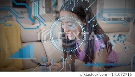Lying purple-top pants girl scrolling phone on beige sofa at home with AR HUD, yellow cushion Lying purple-top pants girl scrolling phone on beige sofa at home with AR HUD, yellow cushion 141072716