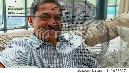 Smiling senior man leaning into sofa cushions in living room, with halftone overlay, striped polo Smiling senior man leaning into sofa cushions in living room, with halftone overlay, striped polo 141072817