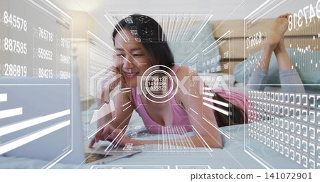 Propping elbows Korean woman wearing pink tank top, using open laptop on bed with AR graphics Propping elbows Korean woman wearing pink tank top, using open laptop on bed with AR graphics 141072901