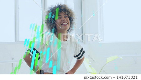 Smiling woman wearing striped tee leaning in bright studio with windows, candlestick overlay Smiling woman wearing striped tee leaning in bright studio with windows, candlestick overlay 141073021