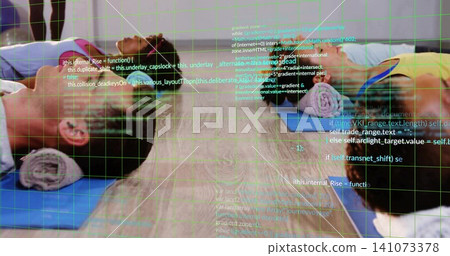 Lying six people wearing activewear relaxing on blue mats at studio with rolled towels code overlay Lying six people wearing activewear relaxing on blue mats at studio with rolled towels code overlay 141073378