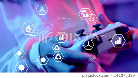 Gripping woman's hands wearing light hoodie using white game controller in dim studio with holo UI Gripping woman's hands wearing light hoodie using white game controller in dim studio with holo UI 141073389