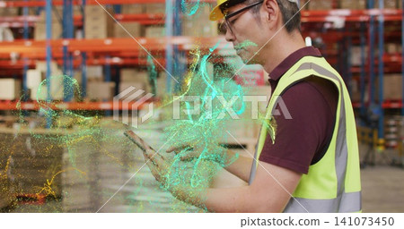 Operating worker in yellow hat and vest, holding tablet near pallet racks with hologram, copy space Operating worker in yellow hat and vest, holding tablet near pallet racks with hologram, copy space 141073450