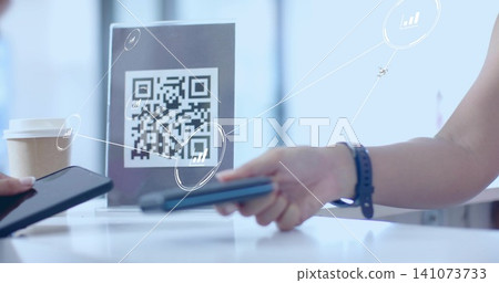 Scanning portrait QR code sign on cafe counter, phones, cup left, band right showing payment Scanning portrait QR code sign on cafe counter, phones, cup left, band right showing payment 141073733