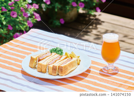 Pork cutlet sandwich, french fries, craft beer, outdoor terrace seating Pork cutlet sandwich, french fries, craft beer, outdoor terrace seating 141074150