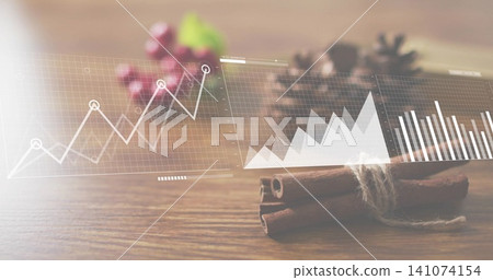 Showing tied cinnamon sticks twine lying on wood table pinecone berries charts overlay, copy space Showing tied cinnamon sticks twine lying on wood table pinecone berries charts overlay, copy space 141074154