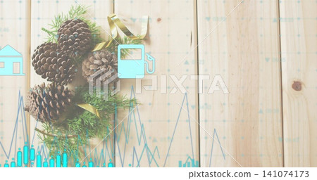 Displaying pine cones with green sprigs and gold ribbon on pale wooden planks, aqua data overlays Displaying pine cones with green sprigs and gold ribbon on pale wooden planks, aqua data overlays 141074173