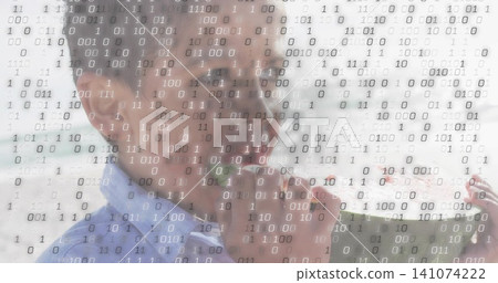 Glancing boy in light blue shirt touching lips while holding phone at window with binary overlay Glancing boy in light blue shirt touching lips while holding phone at window with binary overlay 141074222