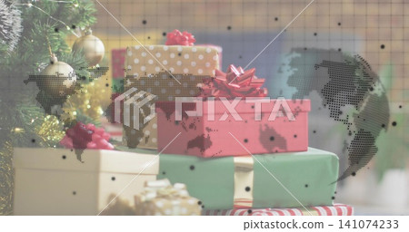 Displaying stacked wrapped gifts resting on mantle in family room, showing dotted world map overlay Displaying stacked wrapped gifts resting on mantle in family room, showing dotted world map overlay 141074233