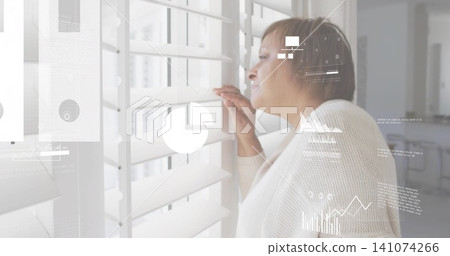 Peering woman in white knit holding plantation shutter at home window with AR overlays, copy space Peering woman in white knit holding plantation shutter at home window with AR overlays, copy space 141074266