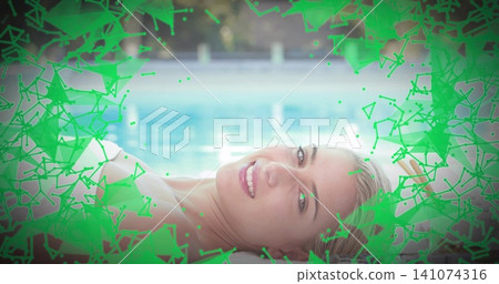 Reclining woman in white swimsuit top lying on lounger by swimming pool, neon-green overlay Reclining woman in white swimsuit top lying on lounger by swimming pool, neon-green overlay 141074316