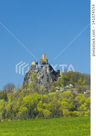Trosky medieval castle ruins standing on dominant rocks Trosky medieval castle ruins standing on dominant rocks 141074554