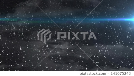 Falling snowflakes forming streaks through low fog at night, showing blue flare with cyan point Falling snowflakes forming streaks through low fog at night, showing blue flare with cyan point 141075243