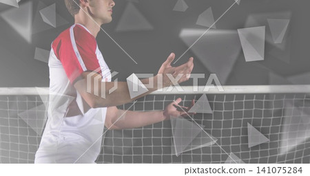 Standing tennis player cupping palms at net on court, wearing white red-sleeved shirt, copy space Standing tennis player cupping palms at net on court, wearing white red-sleeved shirt, copy space 141075284